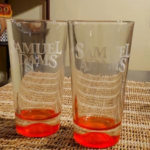 2 pilsner beer glasses